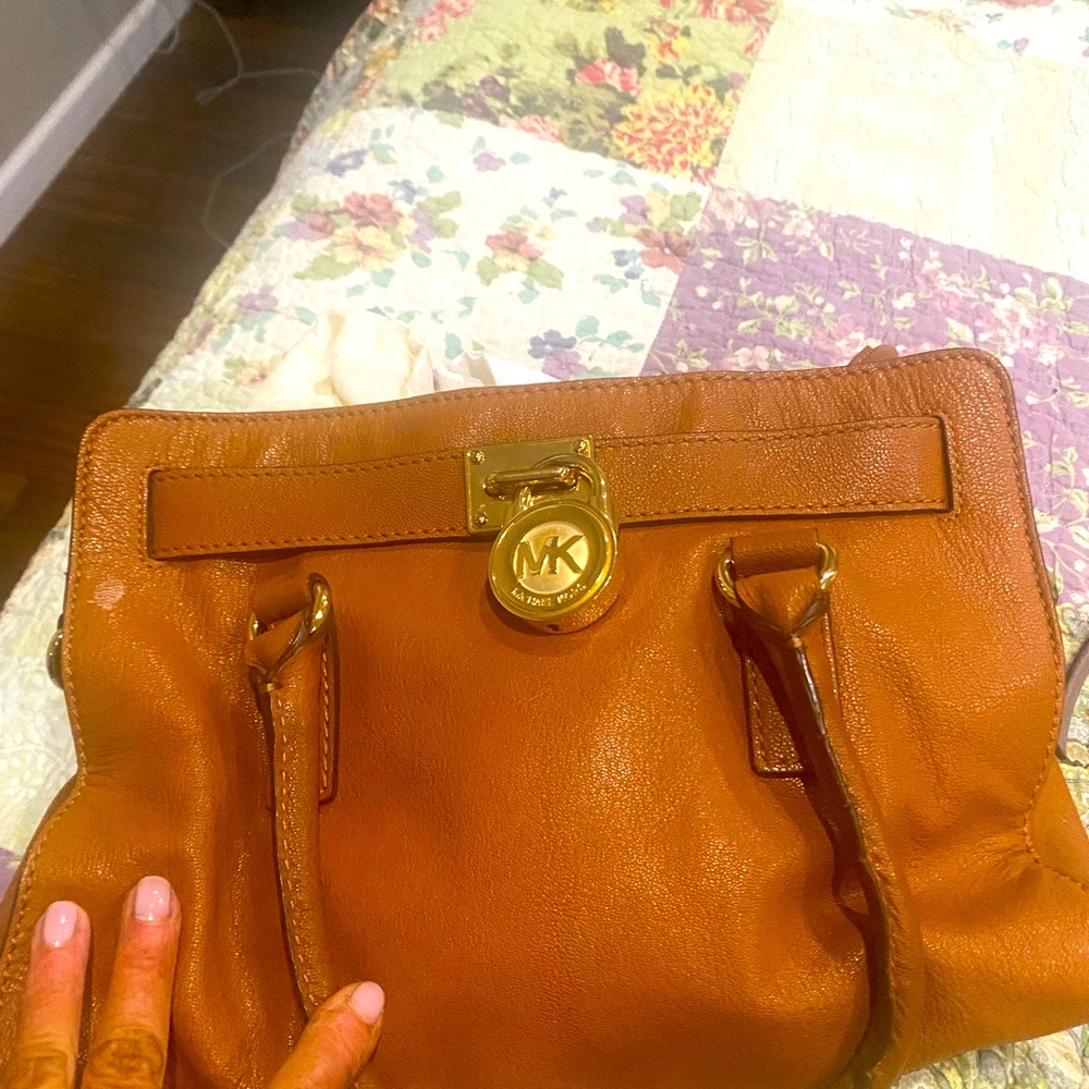 Authentic Michael Kors handbag. Can be carried as a satchel or shoulder bag.